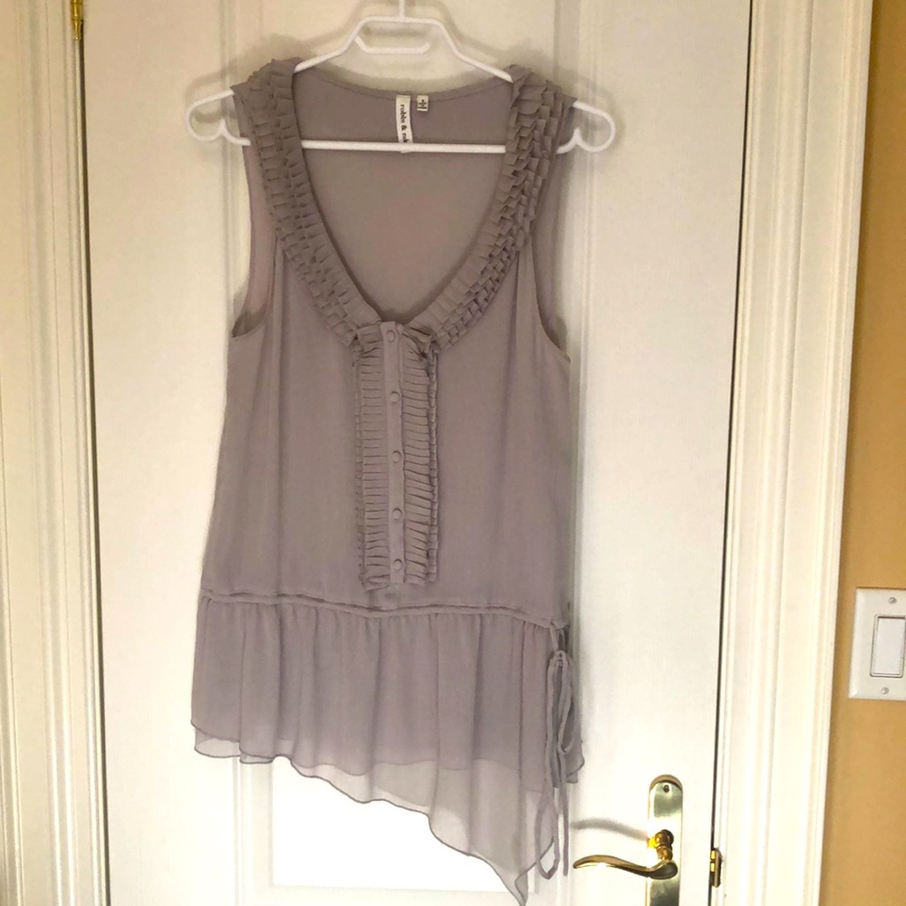 Asymmetrical summer top with bow detail.